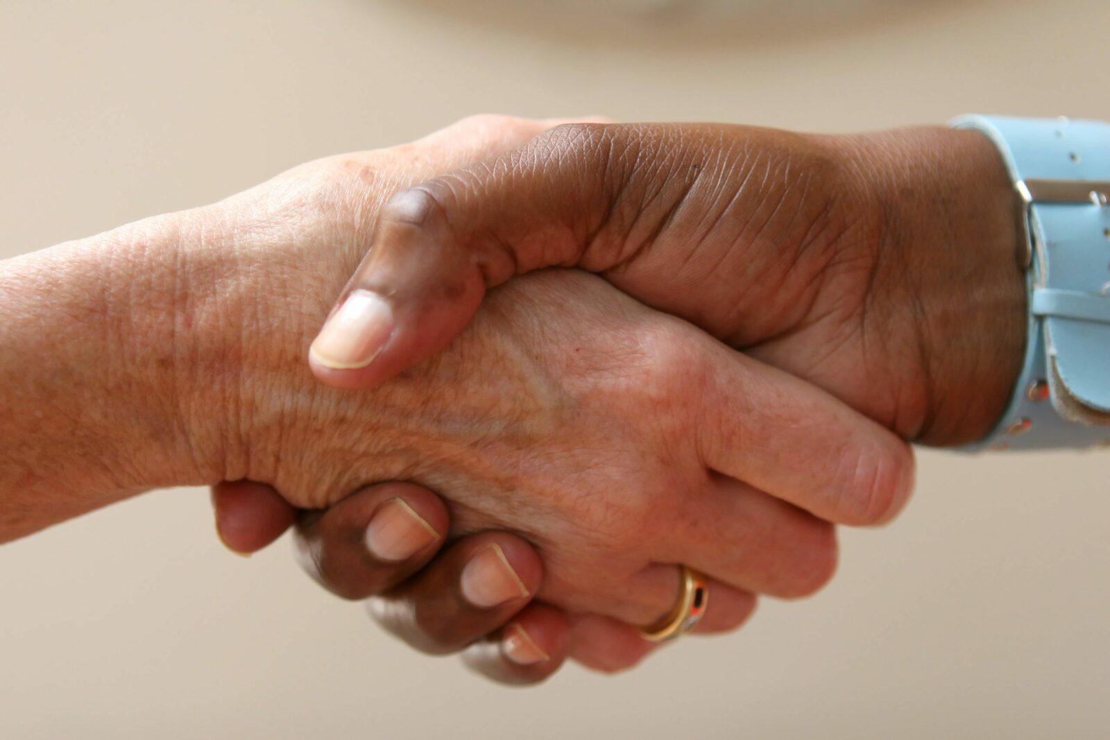helping-hand-shakes-another-in-an-agreement